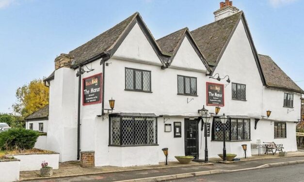 Ancient pub and hotel goes up for sale